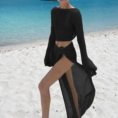 Sophisticated women's summer beach co-ord set, featuring a luxurious long sleeve knit top and stylish skirt in a vibrant solid colour.