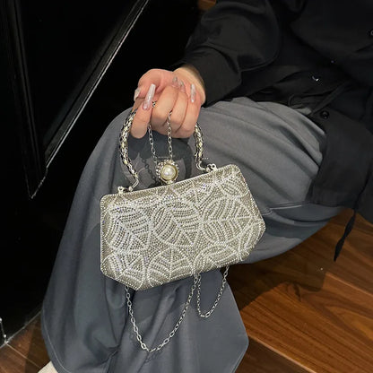 Close-up of the exquisite diamond details on the luxurious retro square box evening bag, highlighting its refined craftsmanship and upscale design.