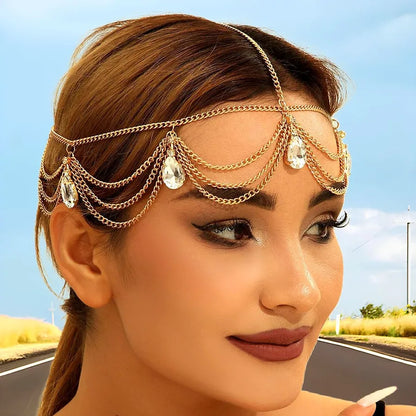 Elegant plaid hair accessory consisting of a chic gold wave chain headband with beautiful waterdrop tassels, ideal for upscale styling.