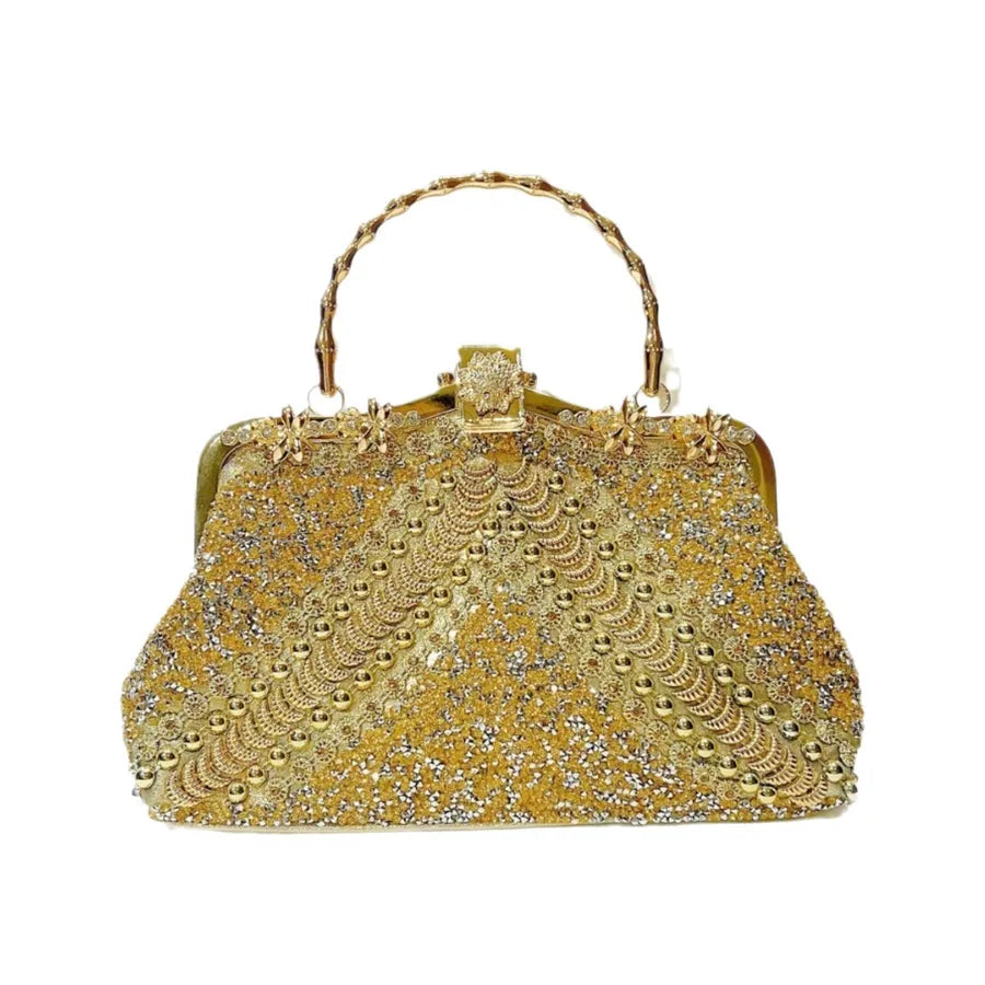 Luxury evening bag featuring a unique pillow shape and sparkling diamond accents, ideal for glamorous occasions.