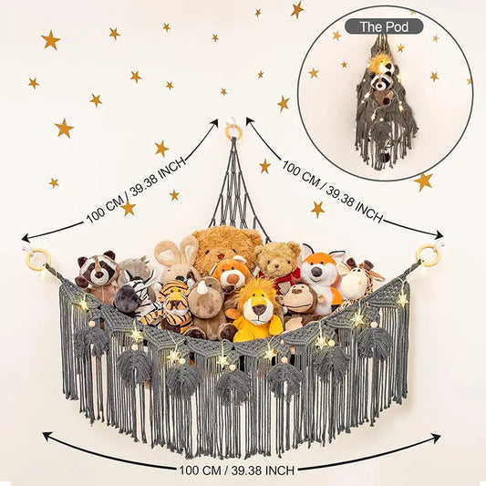 Luxurious handmade cotton rope triangle toy storage net pocket featuring colourful tassels, exemplifying Nordic style elegance.