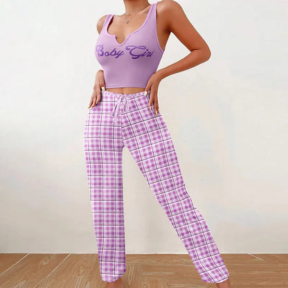 Stylish sleeveless U neck top and plaid trousers leisure set, crafted from premium polyester and milk fiber, suitable for all seasons.