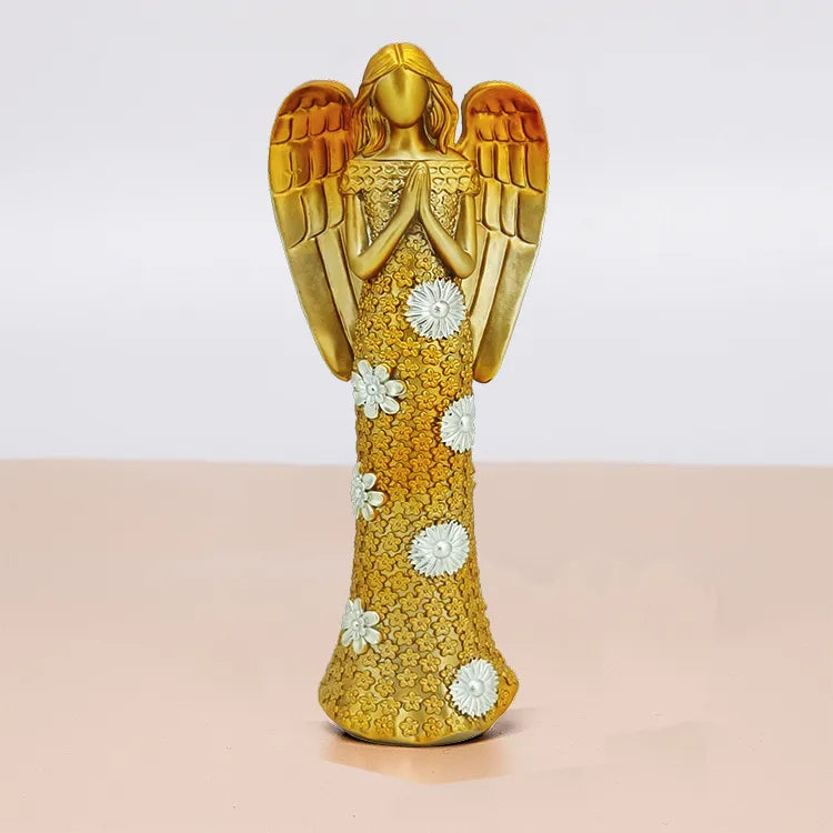 Chic resin ornament of a golden angel, ideal for luxurious indoor settings, showcasing fashion-forward home accessories.