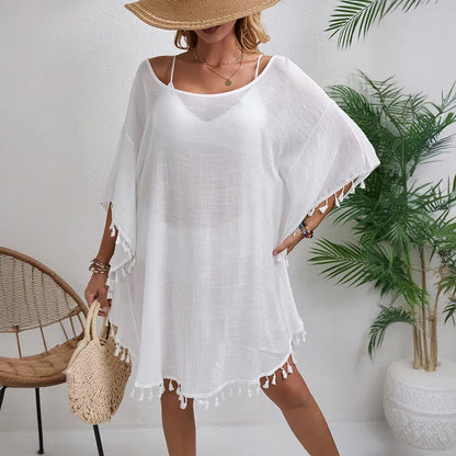 Luxury women's solid colour sexy cover up featuring a U neck and half sleeves, elegantly designed with tassels, perfect for summer wear.