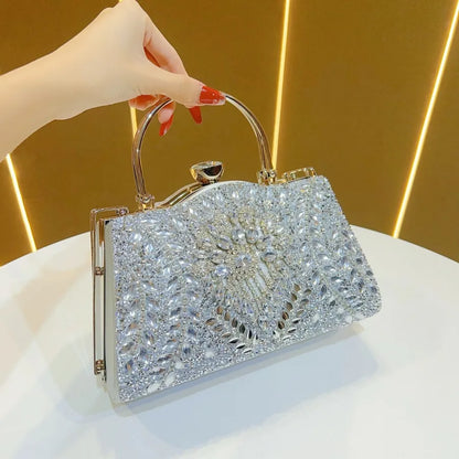 Stylish box-shaped women’s handbag with chain details, perfect for enhancing outfits at weddings and evening parties.