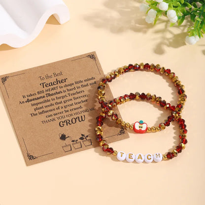Elegant 2-piece elastic apple beaded bracelet set designed for women, perfect as a thoughtful teacher gift for all seasons, featuring intricate acrylic and glass components.