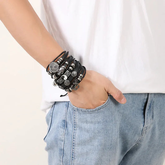 Elegant vintage style men's gossip skull PU leather bracelet with woven chain detail, crafted from premium alloy material for daily wear.