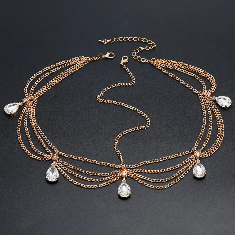 Glamorous plaid patterned hair accessory, showcasing a chic gold wave chain headband with stunning waterdrop tassels.