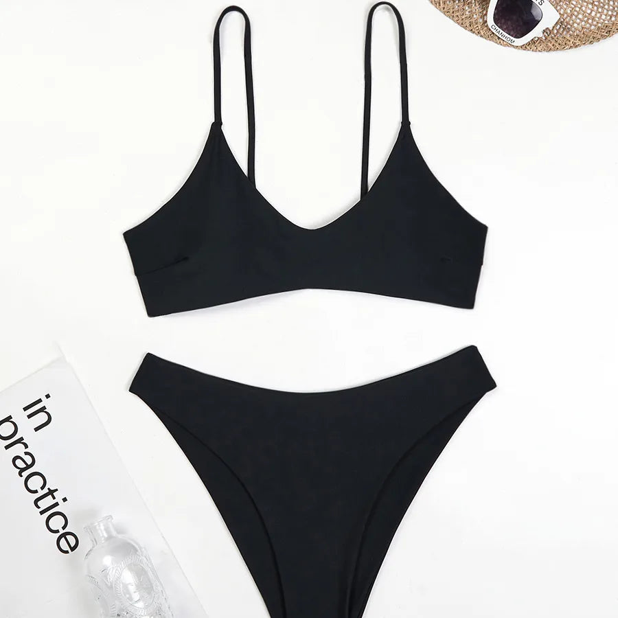 Stylish low waist briefs from a women's solid colour bikini set, ideal for enhancing beachside glamour.