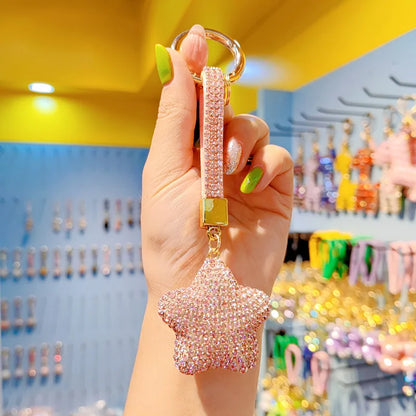 Elegant cartoon full drill star keychain featuring a luxurious tassel, perfect for adding a touch of charm to your accessories.