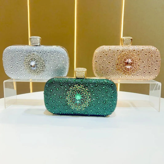 Luxury diamond-embellished square evening bag for women, sophisticated clutch with chain handle, ideal for formal events.