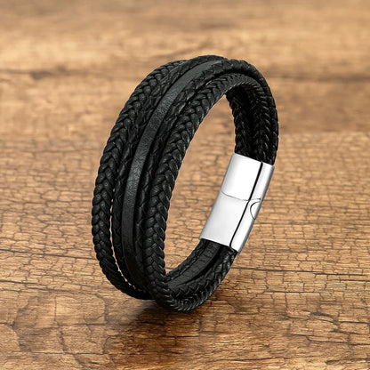 Artistic shot of a men's vintage punk geometric wristband against a textured background, emphasizing its luxurious PU leather and stainless steel craftsmanship.
