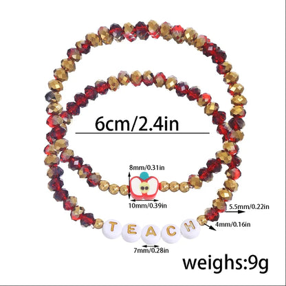 Elegant 2-piece apple beaded bracelet set showcasing stylish design, perfect for all seasons and ideal as a teacher gift.
