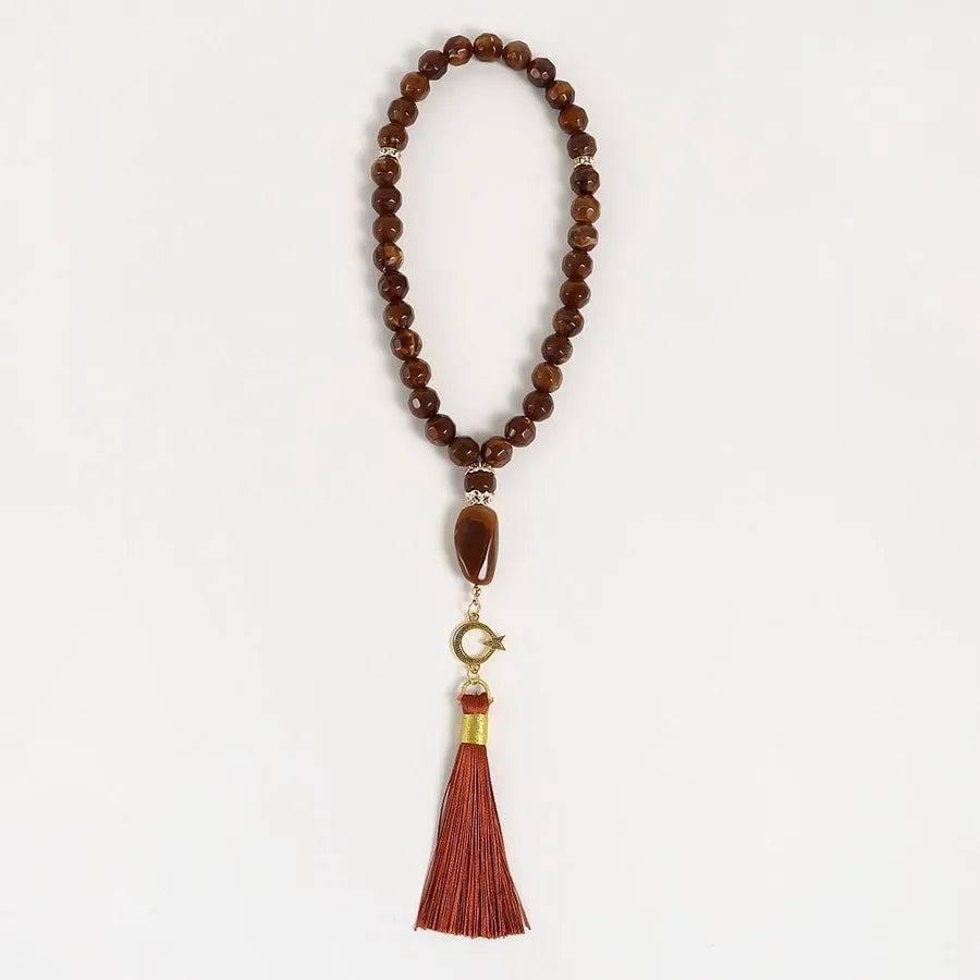 Elegant Presentation of the Unisex Round Tassel Rosary, perfect for formal occasions and crafted with style.