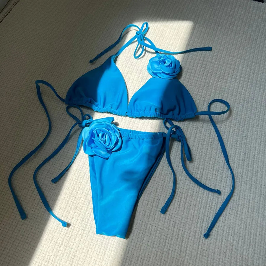 Luxury women's solid colour flower bikini 2 piece set featuring a sexy low waist design, perfect for sunbathing at the beach and swimming pool.