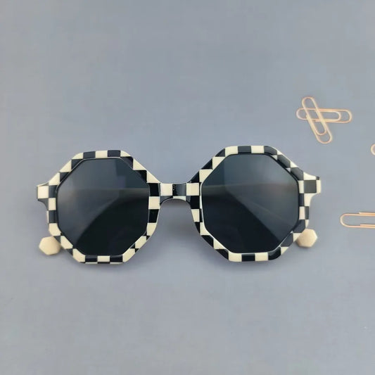 Chic full frame tinted lens sunglasses designed for children, combining modern design with cuteness.