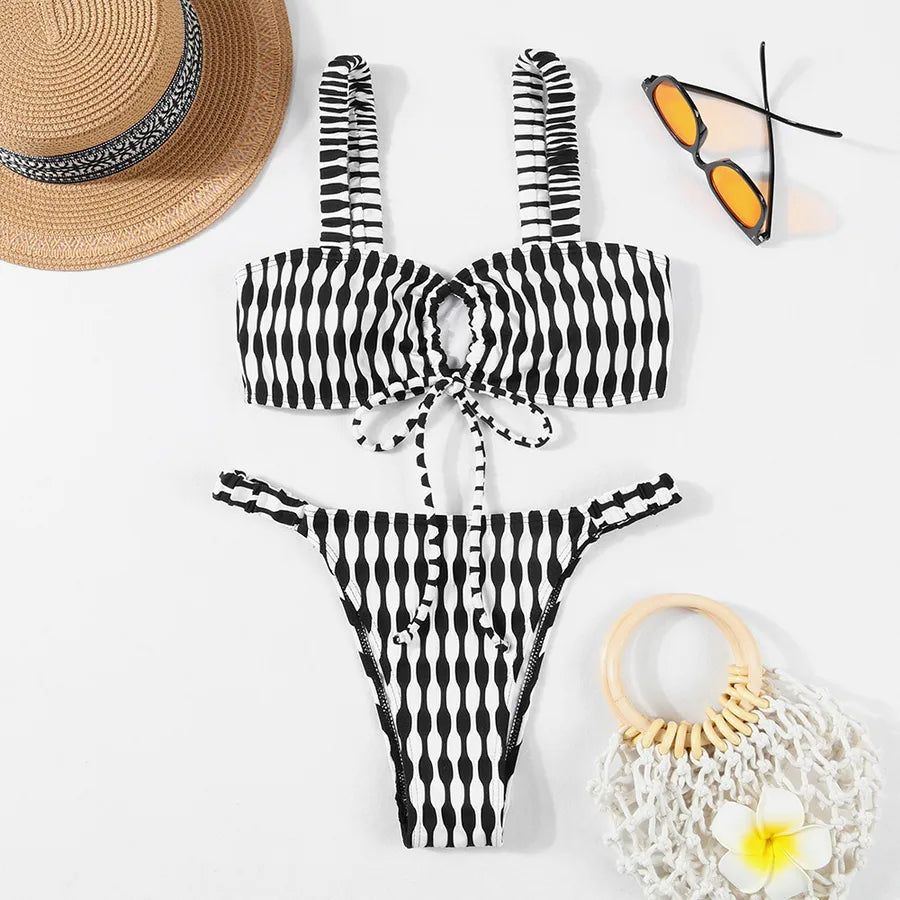 Luxurious women's plaid bikini swimwear set featuring a solid colour design, perfect for summer beach days and poolside lounging.