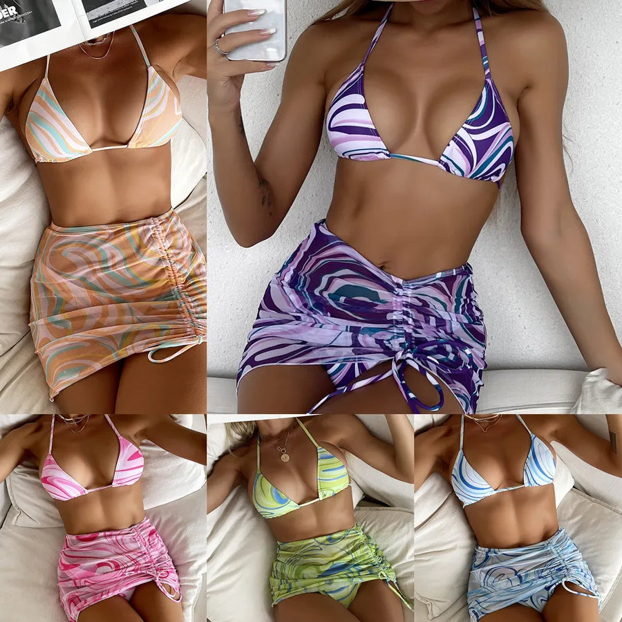 Luxury women's 3-piece halter neck bikini set featuring a stylish waves pattern for elegant beach and poolside wear.