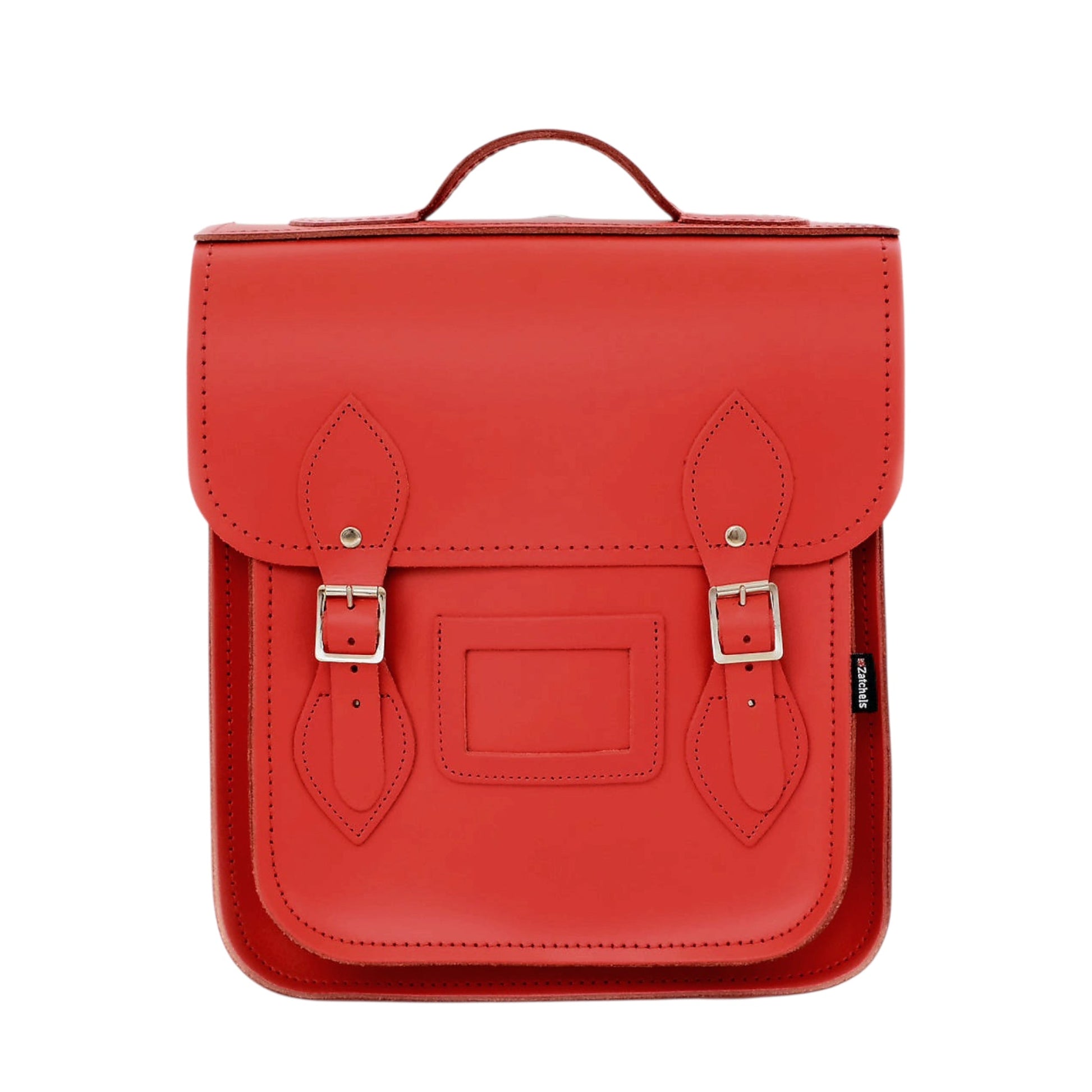 Handmade Leather City Backpack in Pillar Box Red showcasing elegant design with silver nickel buckles and stylish matching stitching, perfect for urban adventures.