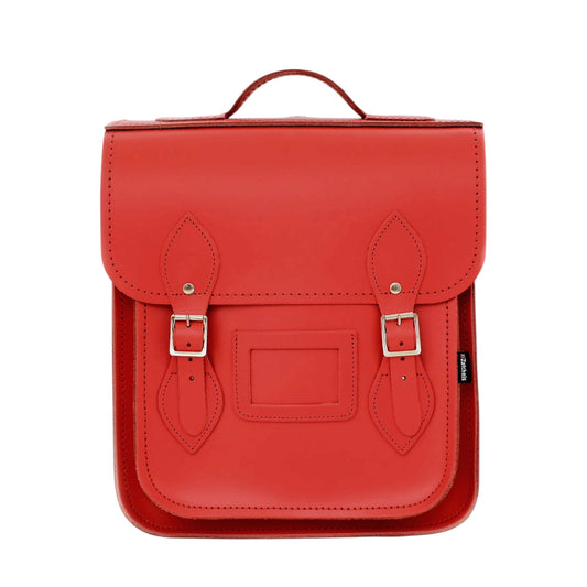 Handmade Leather City Backpack in Pillar Box Red showcasing elegant design with silver nickel buckles and stylish matching stitching, perfect for urban adventures.