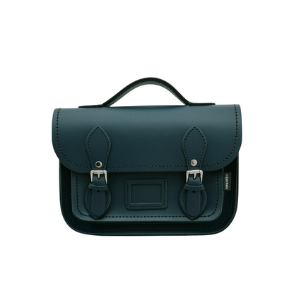 Elegant Pine Leather Midi Satchel showcasing premium craftsmanship with matching stitching and nickel silver buckles, perfect for luxury style.