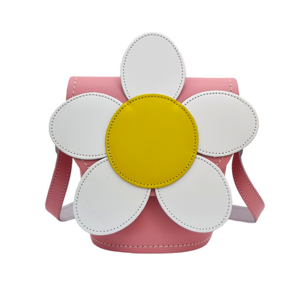 Luxury Handmade Pastel Pink Leather Daisy Barrel Bag by Zatchels featuring exquisite daisy appliqué, adjustable crossbody strap, and secure magnetic fastening, perfect for stylish day-to-night transitions.