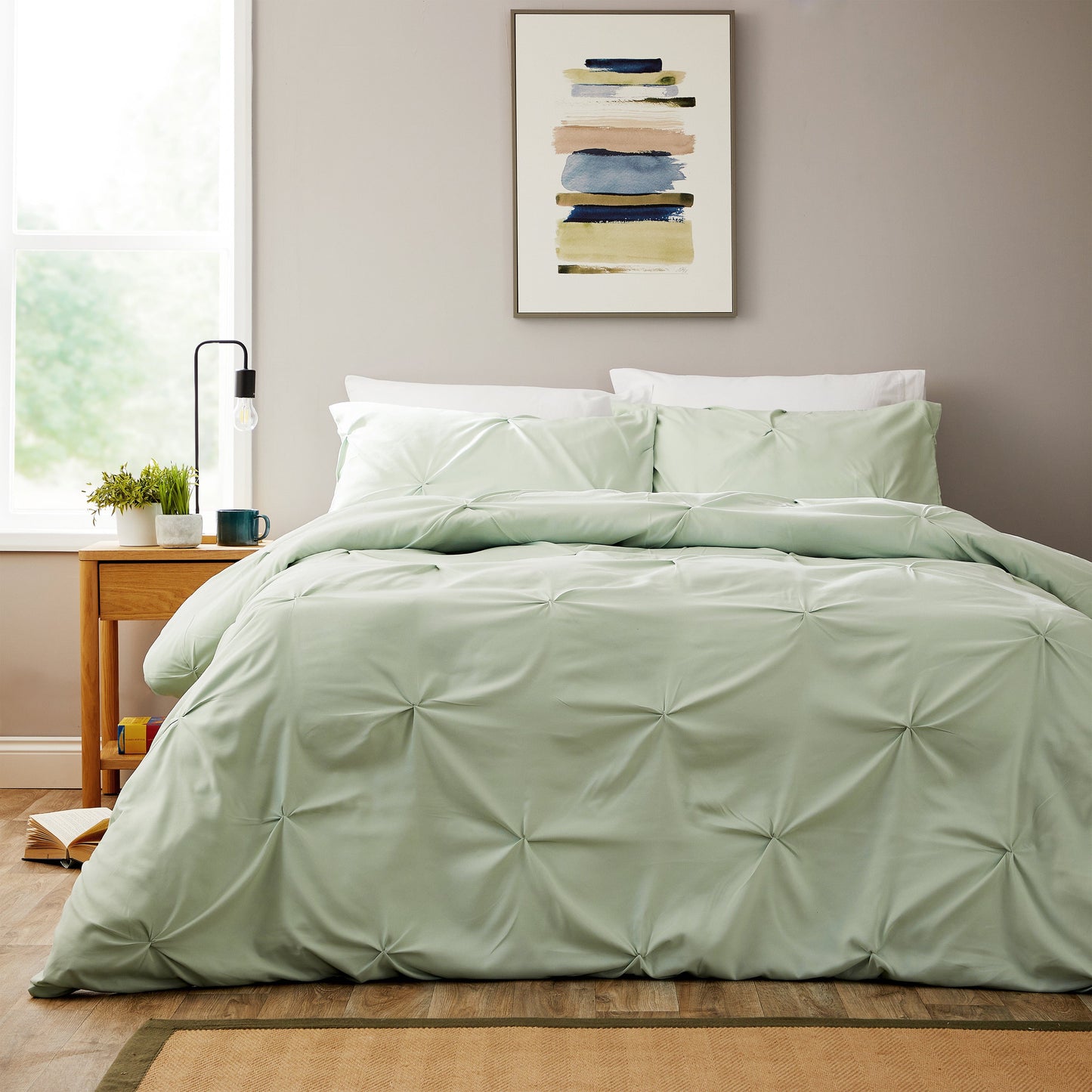 Luxury sage green microfibre duvet cover set by OLIVIA ROCCO featuring an elegant pintuck design, perfect for enhancing bedroom décor with timeless sophistication.