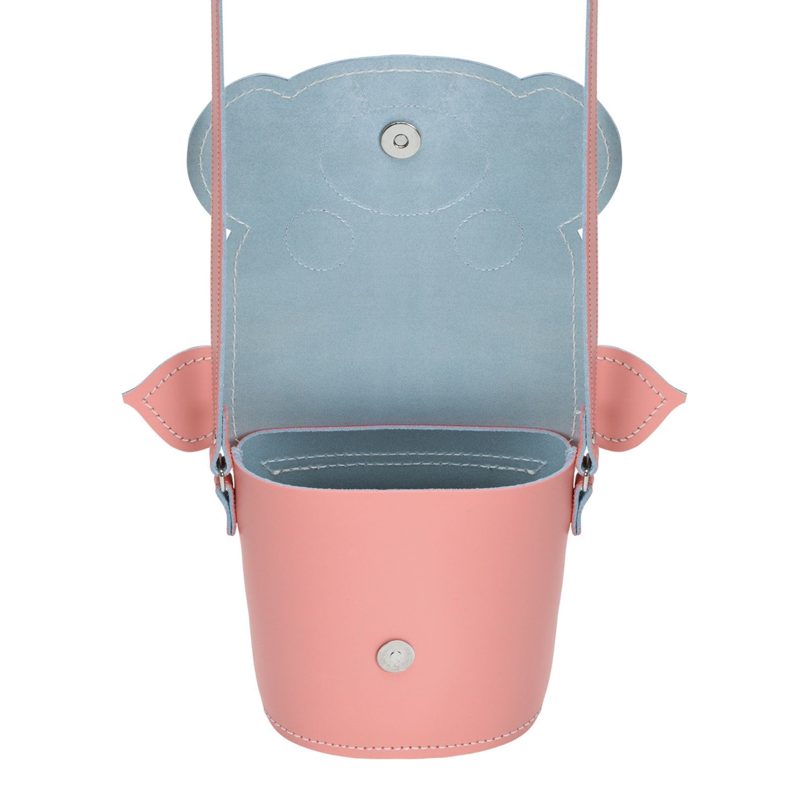 Interior view of Polly Pig Leather Barrel Bag demonstrating ample space for essentials with a compact design, ideal for the stylish individual.