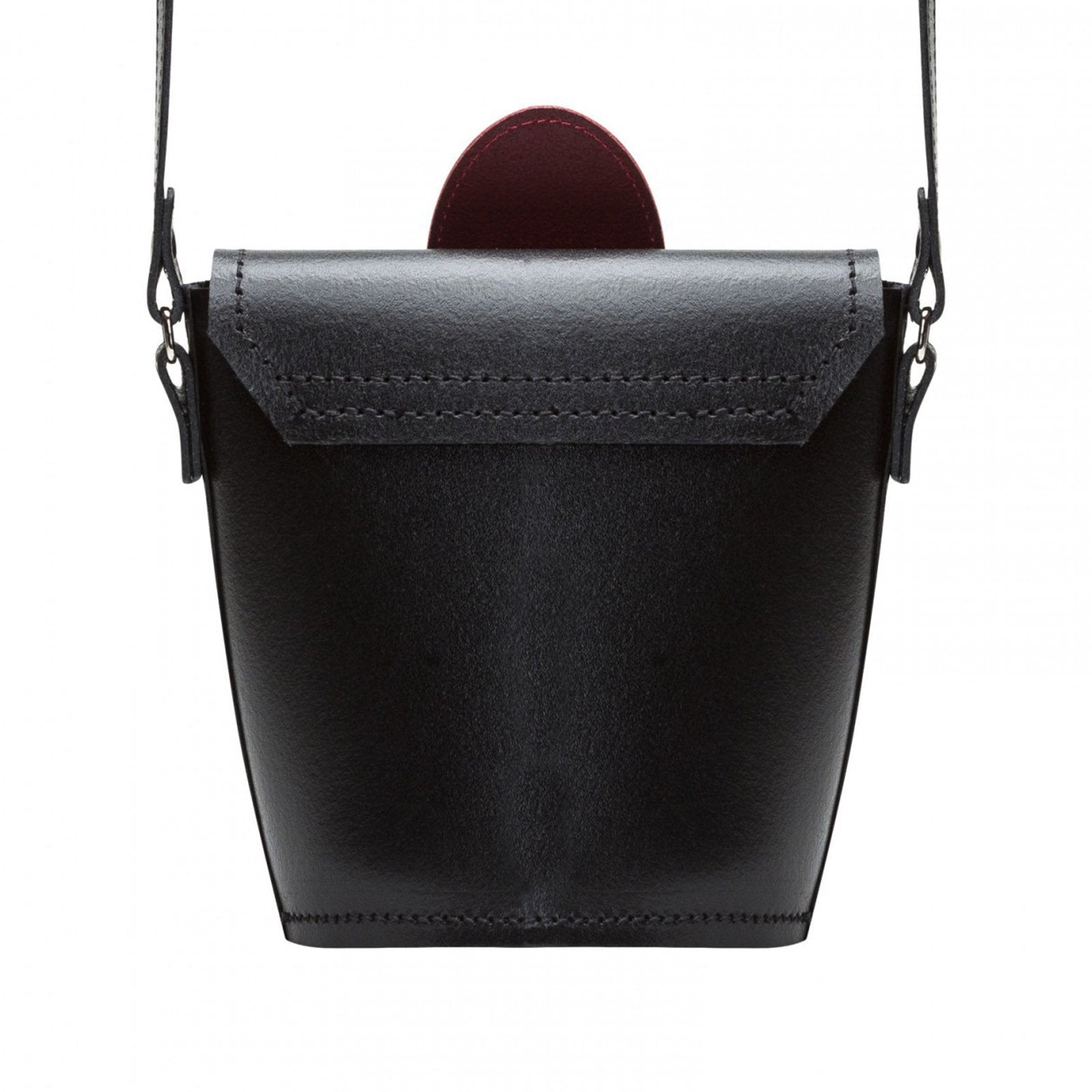 Close-up view of the stunning poppy floral design on the red handmade leather barrel bag, highlighting the intricate detailing and sophisticated style of this luxury accessory.