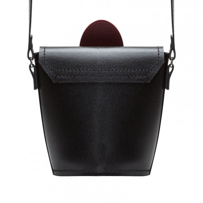 Close-up view of the stunning poppy floral design on the red handmade leather barrel bag, highlighting the intricate detailing and sophisticated style of this luxury accessory.