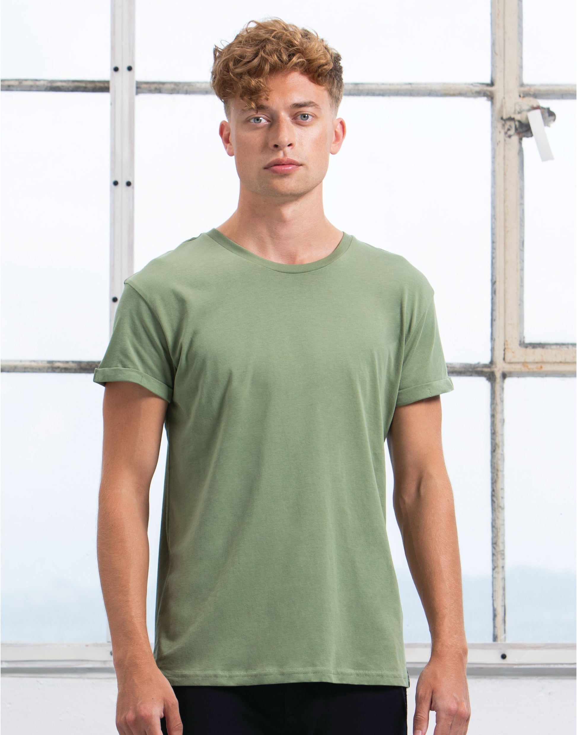 Luxury Men's Roll Sleeve Tee in Organic Cotton, featuring modern fit and eco-friendly design, ideal for stylish, conscious living.