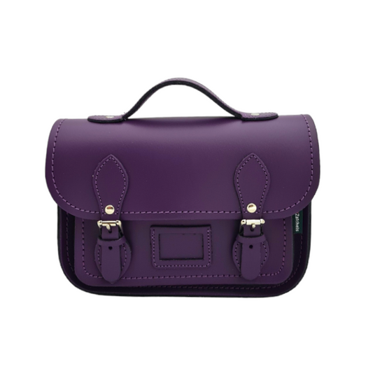 Luxurious handmade purple leather midi satchel from Zatchels featuring an adjustable strap, chic design, and practical spacious interior for essentials. Perfect statement piece for modern elegance.