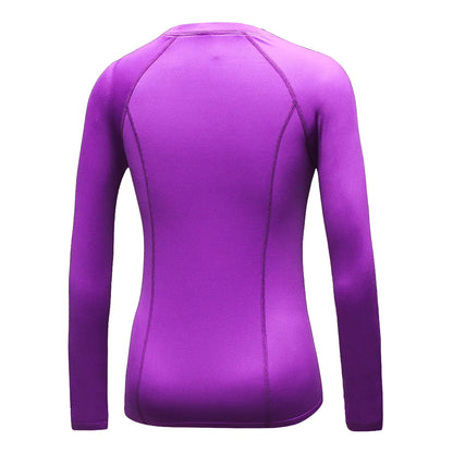 Stylish back view of a women's purple long sleeve compression running shirt, designed for maximum flexibility and breathability during workouts.
