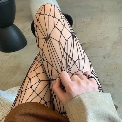 Close-up of Elegant Women's Fishnet Tights, showcasing the exquisite pattern and premium nylon material, enhancing the chic appeal for any fashion-forward woman.