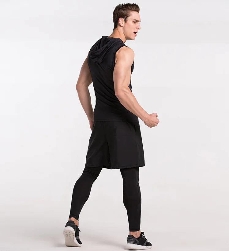 Dynamic side view of a fashionable men's sleeveless training shirt in black, paired with sporty shorts, ideal for active lifestyle and sophisticated workouts.