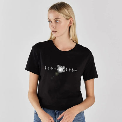 Woman enjoying a summer day in the Leopard Lips Print Women's T-Shirt by Dazzling Dreams Studio, illustrating casual luxury and chic elegance.