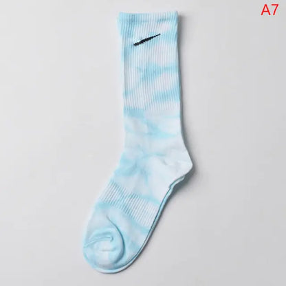 Elegant Women's Tie-Dye Middle Tube Socks in light blue and white, designed for luxury comfort and fashionable flair.