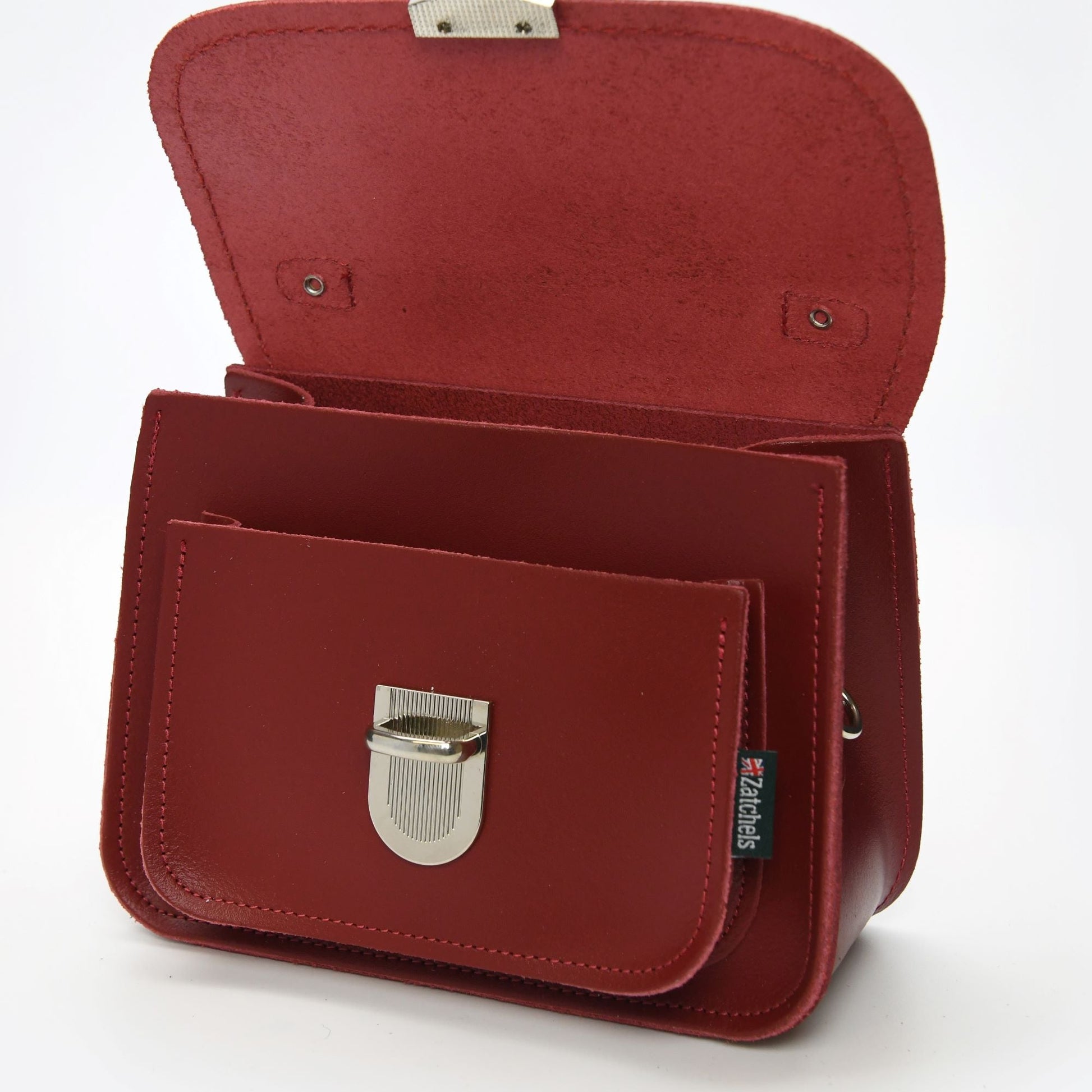 Luna Handmade Red Leather Bag with Detachable Strap showcasing luxurious craftsmanship and vibrant red hue, ideal for stylish crossbody and clutch use.