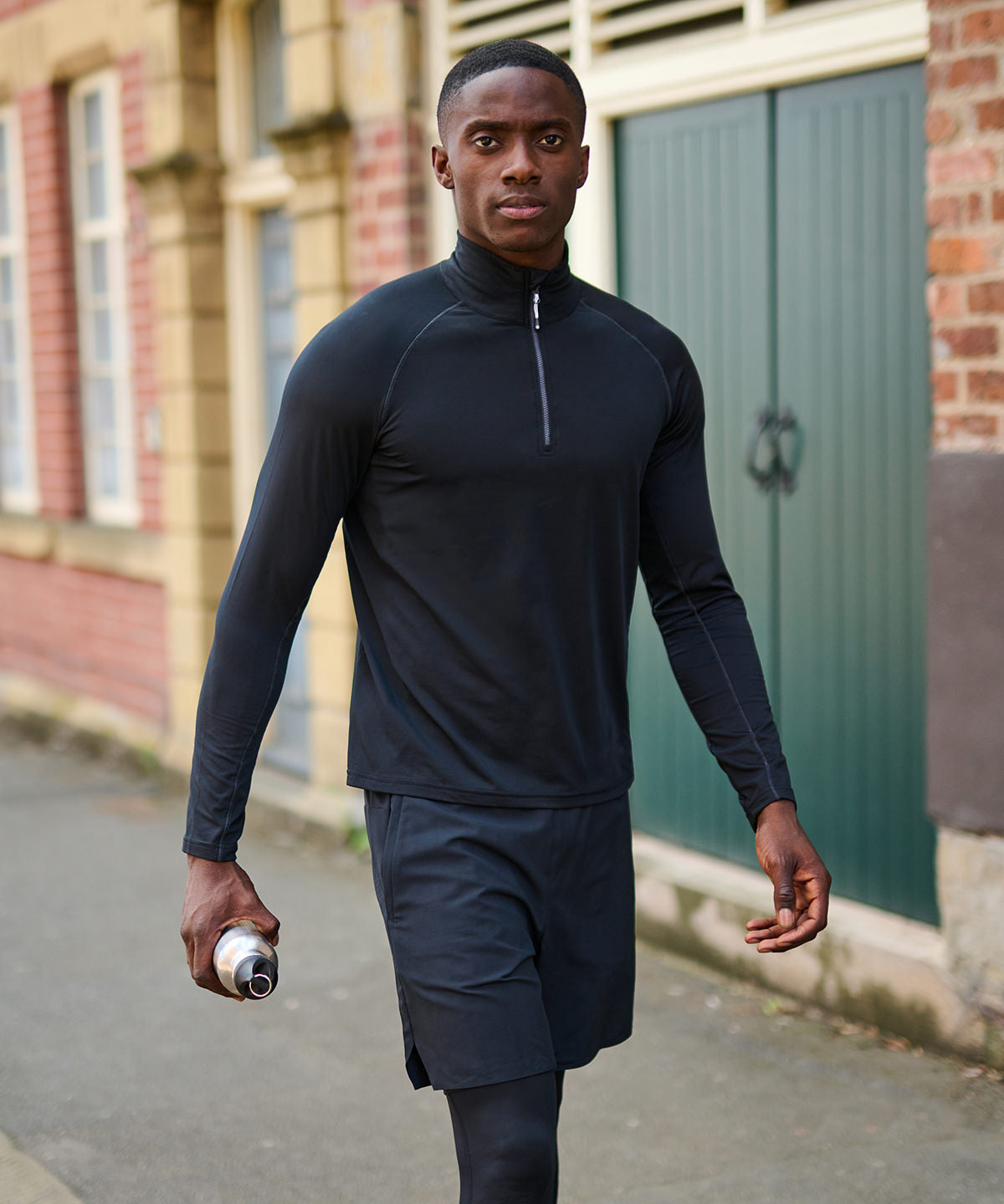 Model showcasing the Regatta Professional Core Stretch Half-Zip Mid-Layer in various sizes from S to 3XL, illustrating its tailored fit and modern aesthetic for both casual and professional settings.