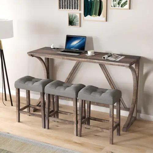 Stylish image of the 'Apex' Artisan Bar Ensemble showcasing a sophisticated solid wood table paired with light grey upholstered stools, perfect for a refined home workspace.