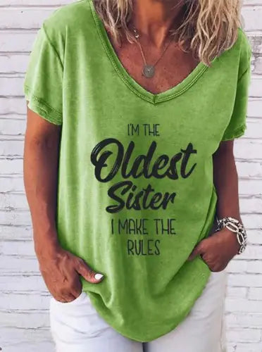 Stylish women's 'I'm The Oldest Sister' cotton blend tee by Dazzling Dreams Studio, featuring a bold design perfect for confident sisters.