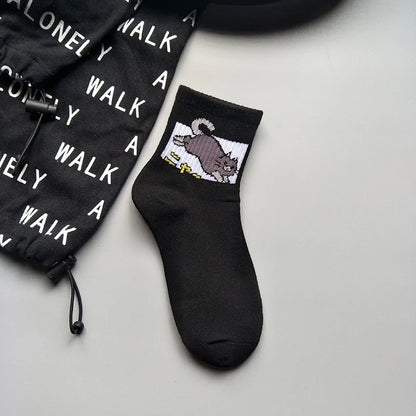 Classic black Stylish Hip Hop Long Socks for Women & Girls with a playful cartoon cat design. Perfectly crafted from soft cotton and polyester blend for a luxurious feel.