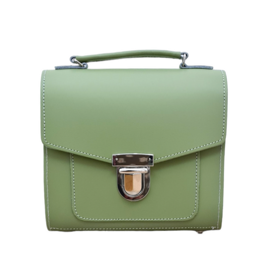 Elegant handmade sage green leather Sugarcube handbag from Zatchels, featuring adjustable crossbody strap and chic clutch design.