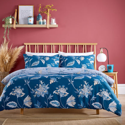 Artistic arrangement of the Shimla Duvet Cover Set with matching pillowcases, emphasizing its chic design and the perfect fit for any size bed, enhancing luxury bedroom decor.