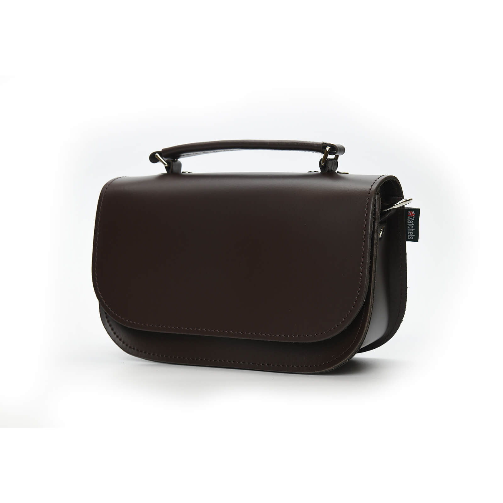 Stylish display of the Aura Luxury Handmade Dark Brown Leather Handbag featuring a detachable strap, magnetic closure, and spacious interior, perfect for modern British elegance in any setting.