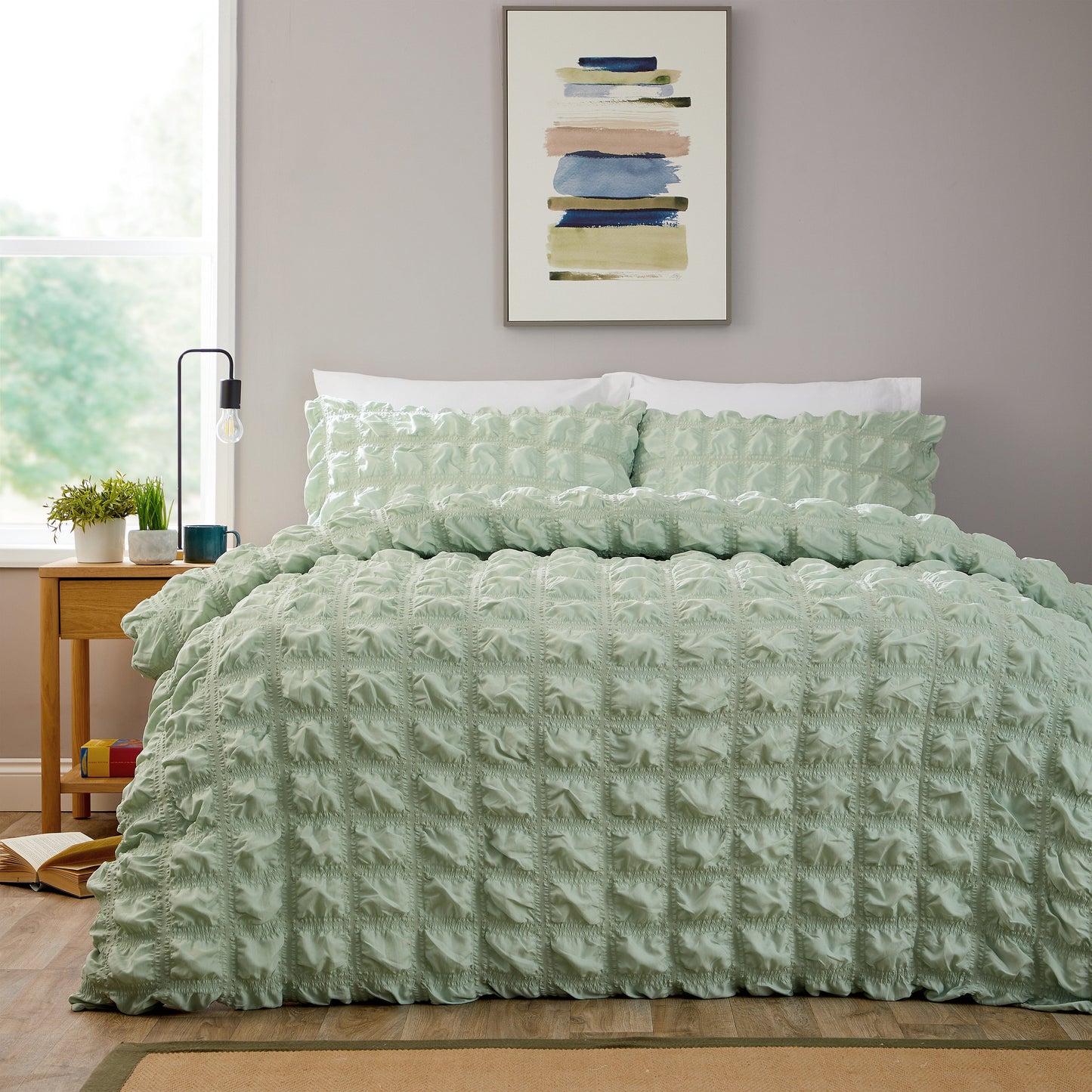 Luxurious Soho Sage Green Microfibre Duvet Cover Set by OLIVIA ROCCO, featuring a quilted design, ultra-soft fabric, and elegant sage green colour, perfect for enhancing modern bedroom decor.