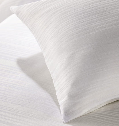 Eco-friendly cotton blend bedding with soft texture featured in a beautifully designed bedroom, perfect for enhancing comfort and style.