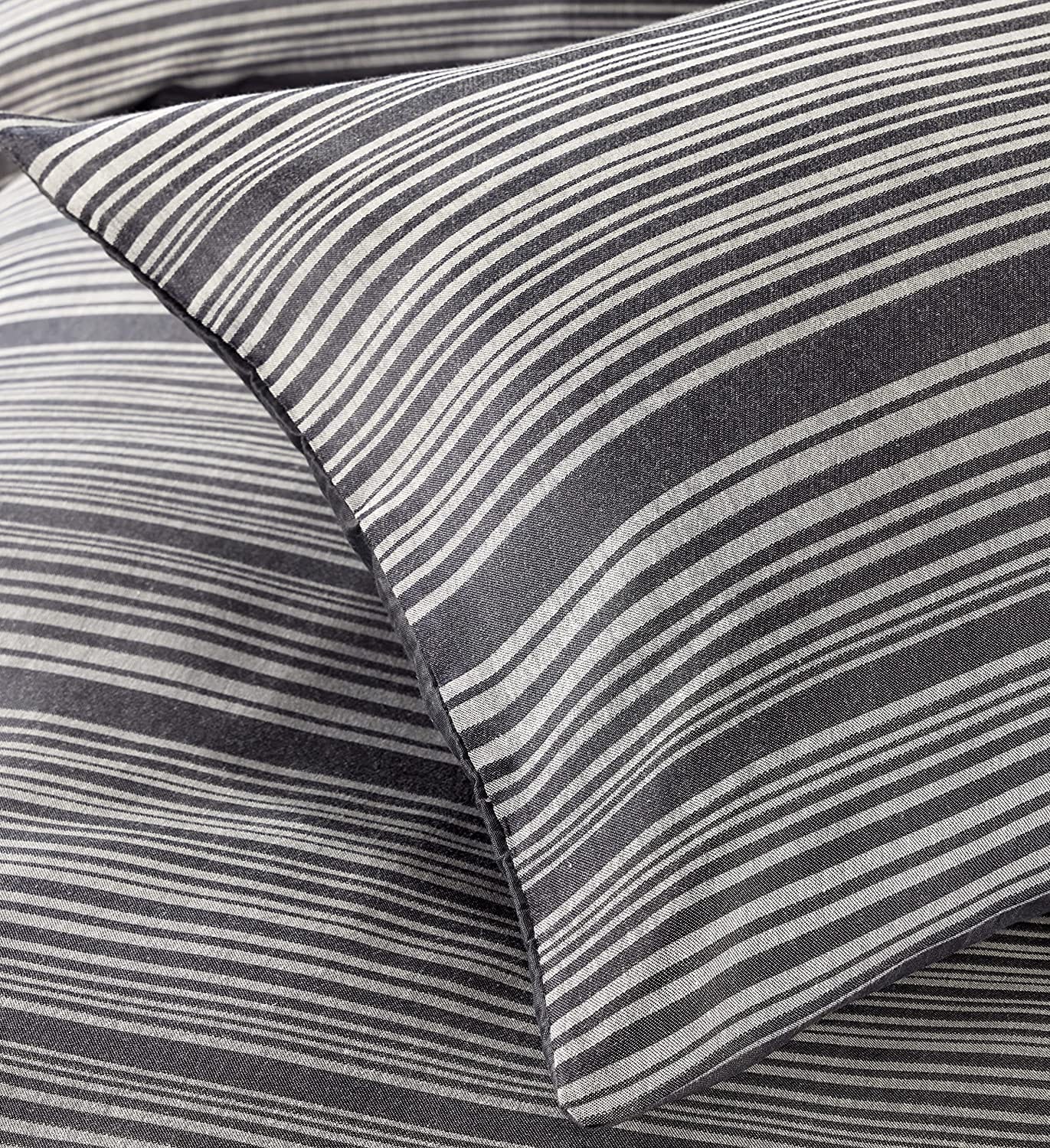 Reversible cotton blend duvet cover set featuring sophisticated stripe pattern, ideal for enhancing bedroom decor.