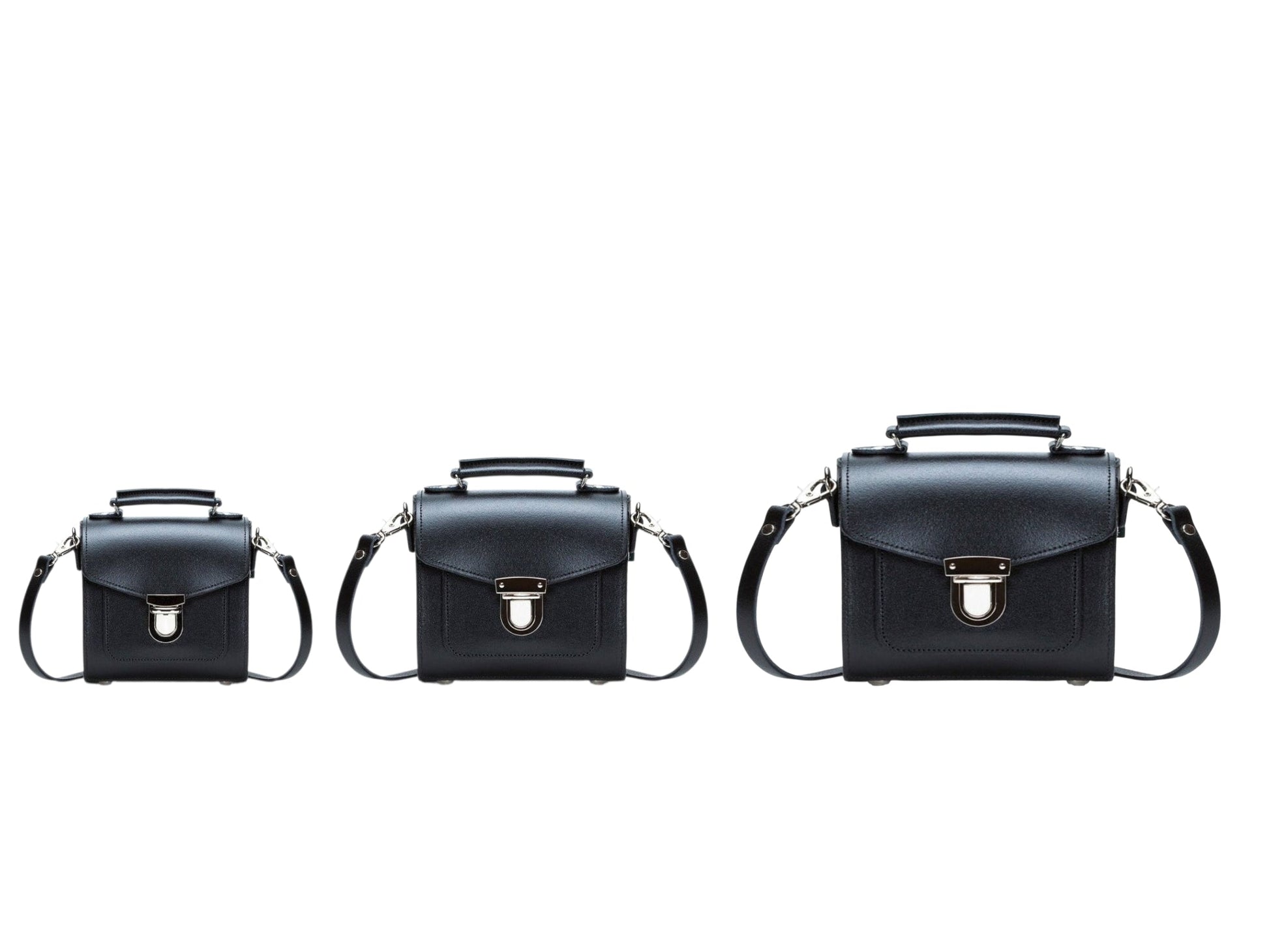 Stylish model elegantly carrying the Handmade Zebra Leather Sugarcube Handbag in Grande size, highlighting its chic appeal for both day and evening events.