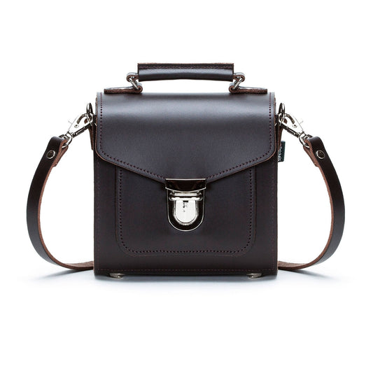 Elegant Dark Brown Handmade Leather Sugarcube Handbag showcasing its chic design, adjustable detachable strap, and premium craftsmanship, perfect for any upscale occasion and available in three sizes.